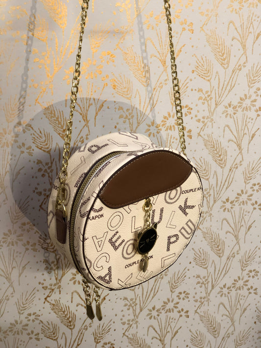 Round Crossbody Handbag for Women in Pakistan – Stylish PU Leather Bag with Cute Cat Keychain